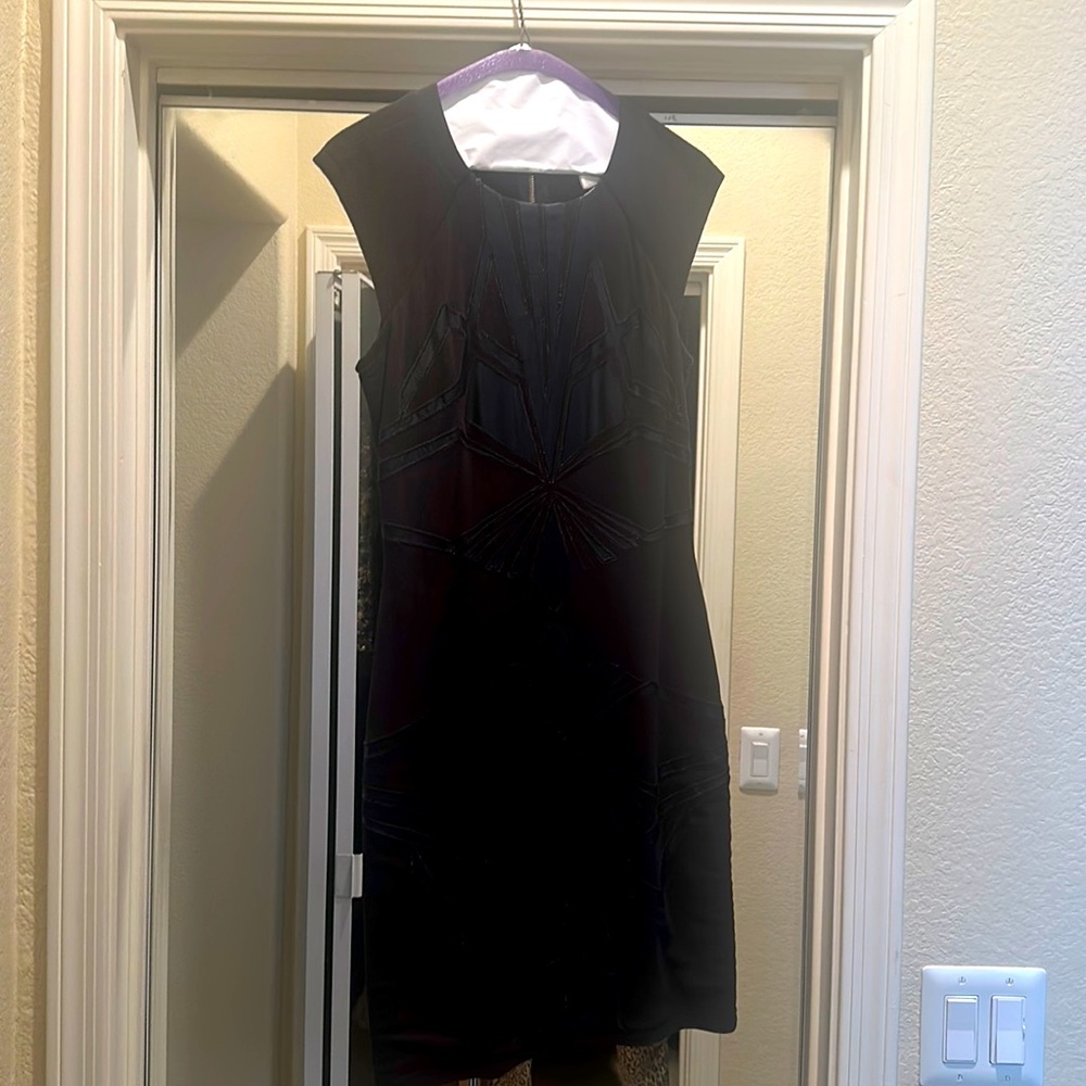 Black dress with faux leather inlay design